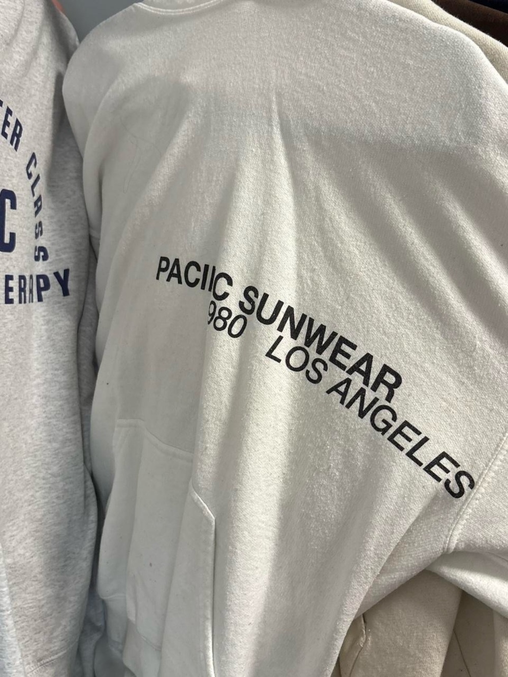Pacific Sunwear White Pullover Hoodie with Black Text